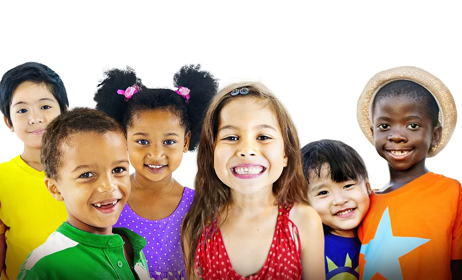 Children smile with missing teeth.