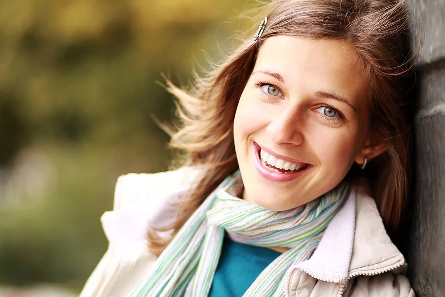Closeup portrait of a happy young woman smiling